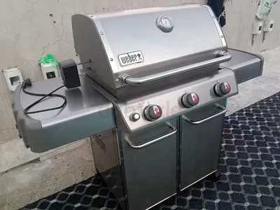 Weber Genesis E310 3 burnols Used gas grill BBQ is for sale