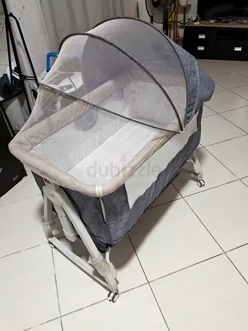 Portable bedside baby bassinet with mosquito net - gently used