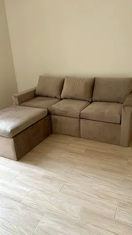 L-shaped beige fabric corner sofa with chaise - good condition. Never used, new