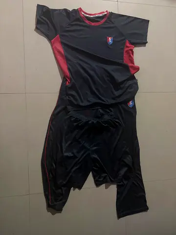 Gems Founders track suit including shorts.