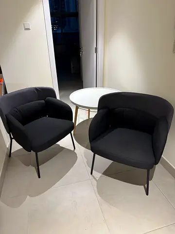 Pair of modern black lounge chairs & coffee table — good condition