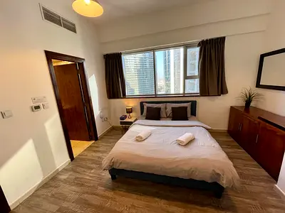 Luxury Furnished Room in Business Bay | Near Metro | Attached Bath | TV & Fridge