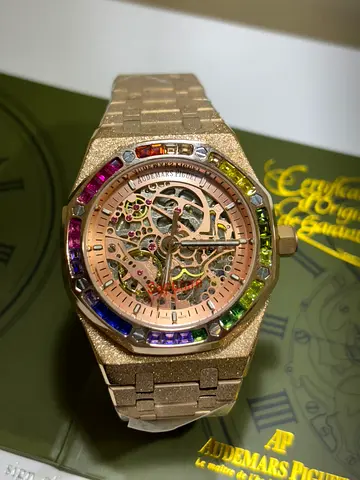 Audemars Piguet style skeleton watch with rainbow gemstones