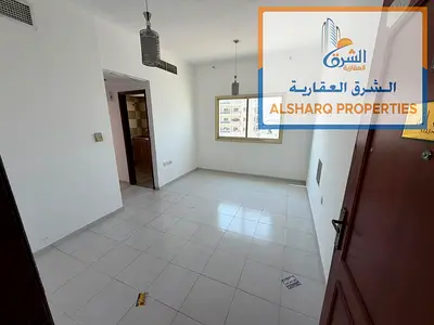 One-bedroom apartment (with living room) for annual rent in Al Rashidiya 2, Ajman – AED 25,000 – Balcony with an excellent view – Bright, well-lit apa