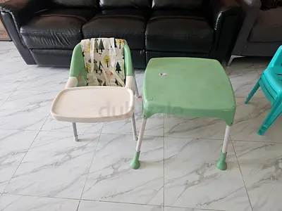 Used baby high chair with detachable tray and matching activity table - green