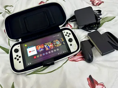 Nintendo Switch OLED (White) with Case,and Charger - Good Condition