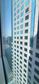 *For Rent: 3-Bedroom Apartment with Living Area in Al Khan – Features a Great Open Rear View and P