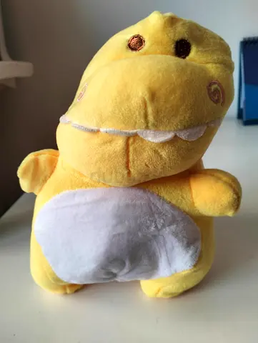 Soft yellow dinosaur plush toy - good used condition