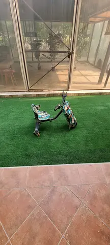 Kids three-wheeled scooter / tricycle - foldable, used