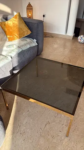 Glass top coffee table with gold metal frame - good condition