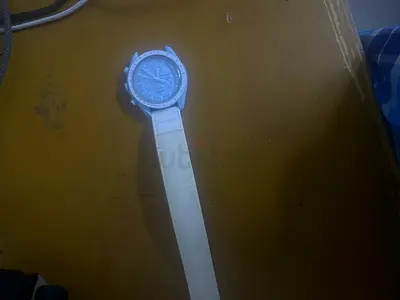 White wristwatch with leather strap - preowned mission to Uranus