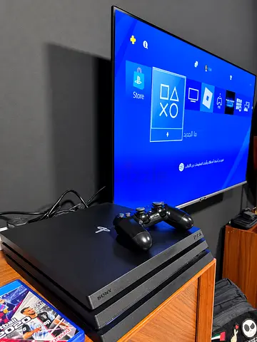 Sony PlayStation 4 Pro with DualShock controllers - Good condition
