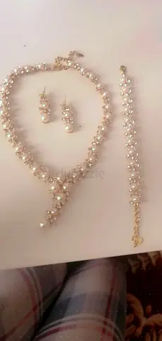 Pearl and crystal jewelry set — necklace, bracelet, matching earrings (used)