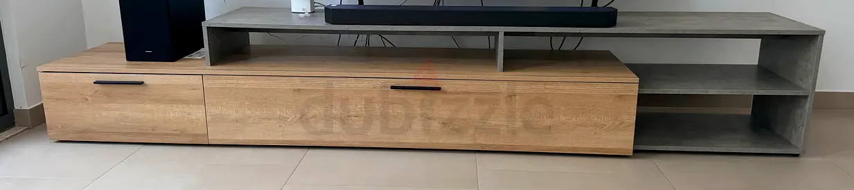 Modern low TV entertainment unit - oak finish with concrete-effect shelving