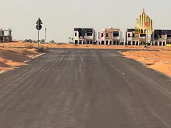 Two Adjacent Corner Plots for Sale in Al Surrah