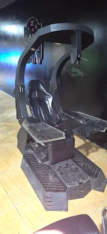 Full-motion racing simulator cockpit with seat, pedals and wheel mount