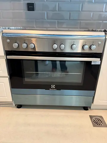 Electrolux freestanding gas oven and cooker - brand new, never used, still with cover