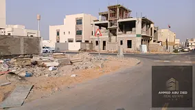 Residential villa plot, corner lot facing two streets, located in Al Zahia—an area that is already