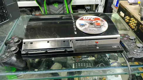 Sony PS3 with 1cd and 2 controllers