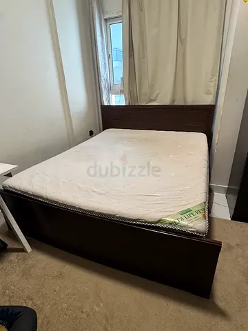 Ikea wooden bed frame with headboard - for free