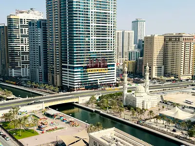 1BR with balcony in Al Khan Sharjah Free AC partial sea view gym pool and kids area First year rent AED 48000