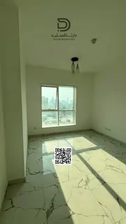 Two bedrooms and a living room for annual rent in Al-Waha Towers in Al-Rashidiya, Al-Mina Street