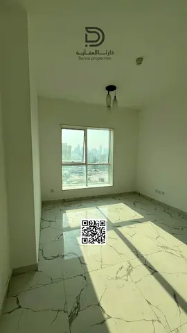 Two bedrooms and a living room for annual rent in Al-Waha Towers in Al-Rashidiya, Al-Mina Street