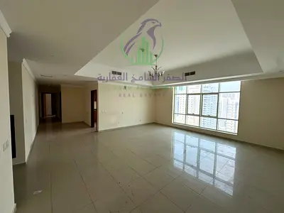 شقة غرفتين وصالة للإيجار في التعاون بالشارقة | إطلالة بانورامية | بلكونتان | حمامان | جيم مجاني