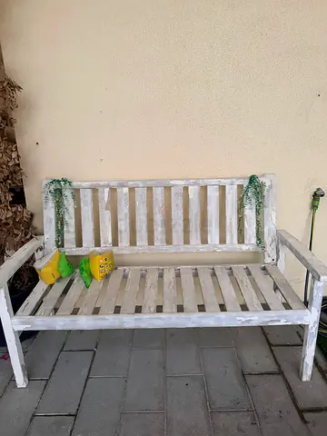 Wooden whitewashed single bench with slatted back - good condition