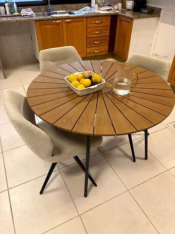 JYSK Round wooden dining table with 5 upholstered chairs - compact set
