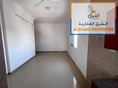 2️⃣ Studio for annual rent, spacious layout, located in Al Rawda 2, Ajman – near Sheikh Ammar Street. Features: Spacious studio with a balcony and c