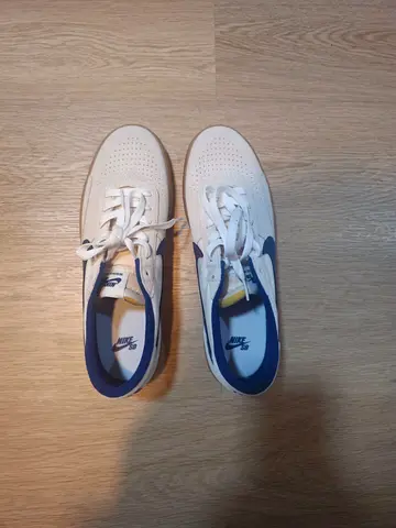 White Nike sneakers — lightly used, men's size (see photos)