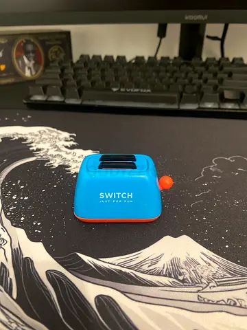 Nintendo switch game cartridge holder with a toaster design