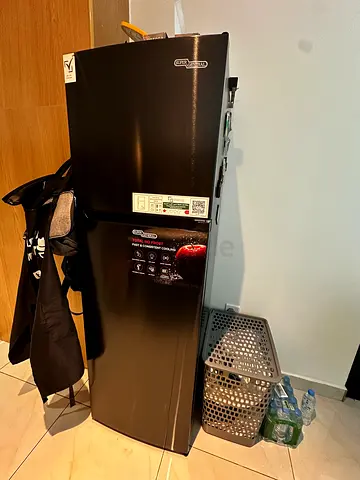 Used single-door black refrigerator - good condition