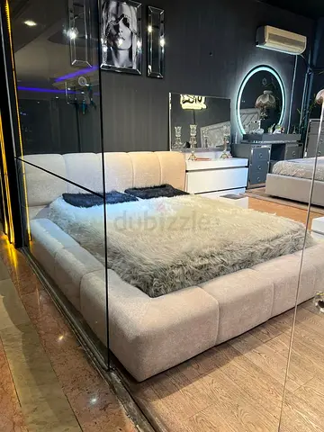 Low-profile upholstered platform bed with padded headboard (queen/king) - light grey
