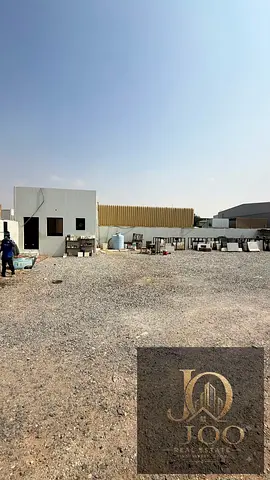 Industrial Land for Rent in Umm Al Deraa, Umm Al Quwain | 11,000 Sq. Ft. Fully Fenced Open Yard wit