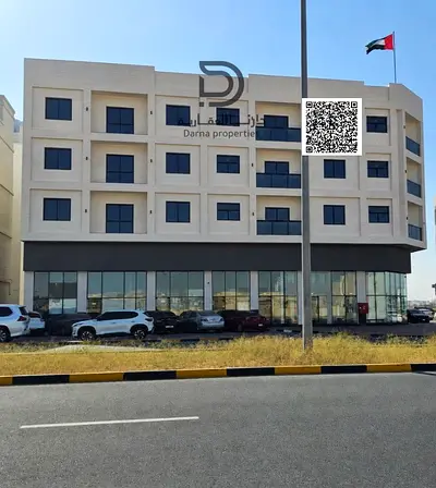 Brand-New Residential & Commercial Building for Sale in Al Alia, Ajman, Directly on the Main Road, 10 Shops, 22 Units, AED 1M Annual Income, AED 13.5