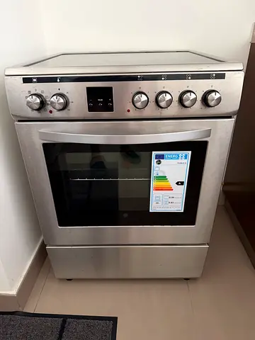 Stainless steel freestanding electric oven with glass door - good condition