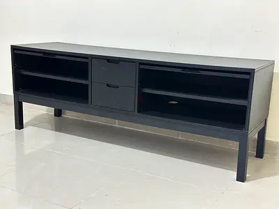 Black IKEA TV Unit – 160 cm
Black TV unit with a practical storage compartment, suitable for modern
