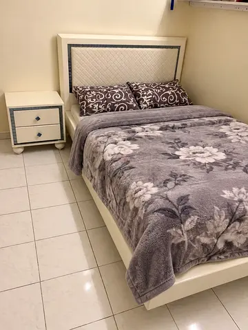 2 White queen bed frame with headboard and matching bedside table - good condition