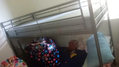 Metal bunk bed frame with mattress - good condition