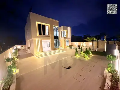 A residential and investment opportunity: a luxury villa in Al Yasmeen, Ajman. Includes electricity, water, and air conditioning; features 6 master be