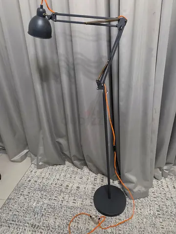 Adjustable Black Articulating Floor Lamp with Orange Cord, from the one
