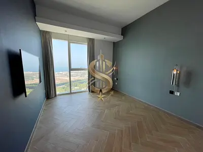 Elite 2BR High-Floor Corner Suite | Dual Views of Burj Al Arab & Palm Jumeirah | Balcony