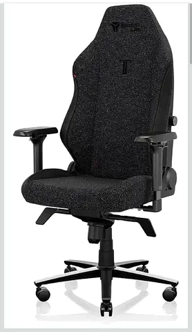 Used ergonomic gaming/office chair with adjustable armrests – dark grey fabric