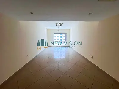 Two rooms with free air conditioning, a balcony, and built-in wall closets; located near the Dubai exit.