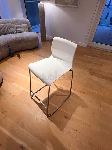 White bar stool with chrome frame