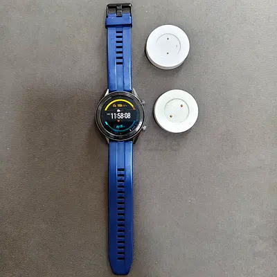 Used Huawei GT Watch with two charging docks - Blue strap