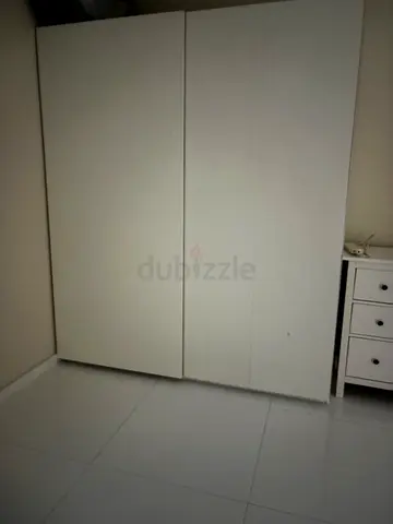 White 2-Door Sliding Wardrobe - Good Condition