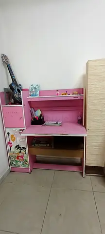 Pink kids study desk with shelves and storage - good condition